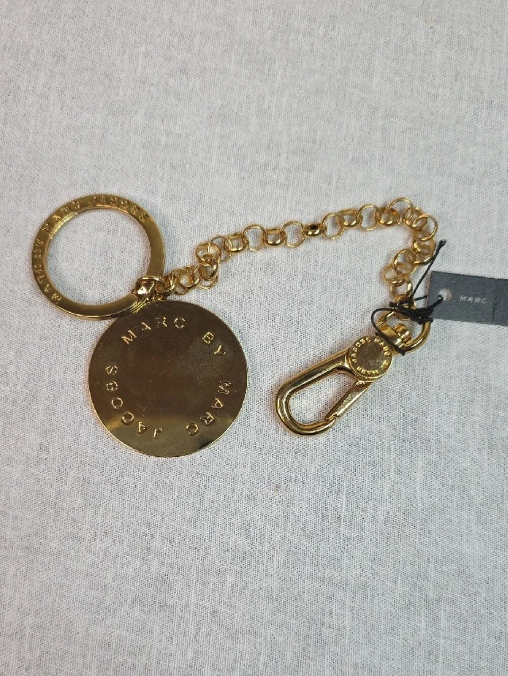 Marc By Marc Jacobs gold tone